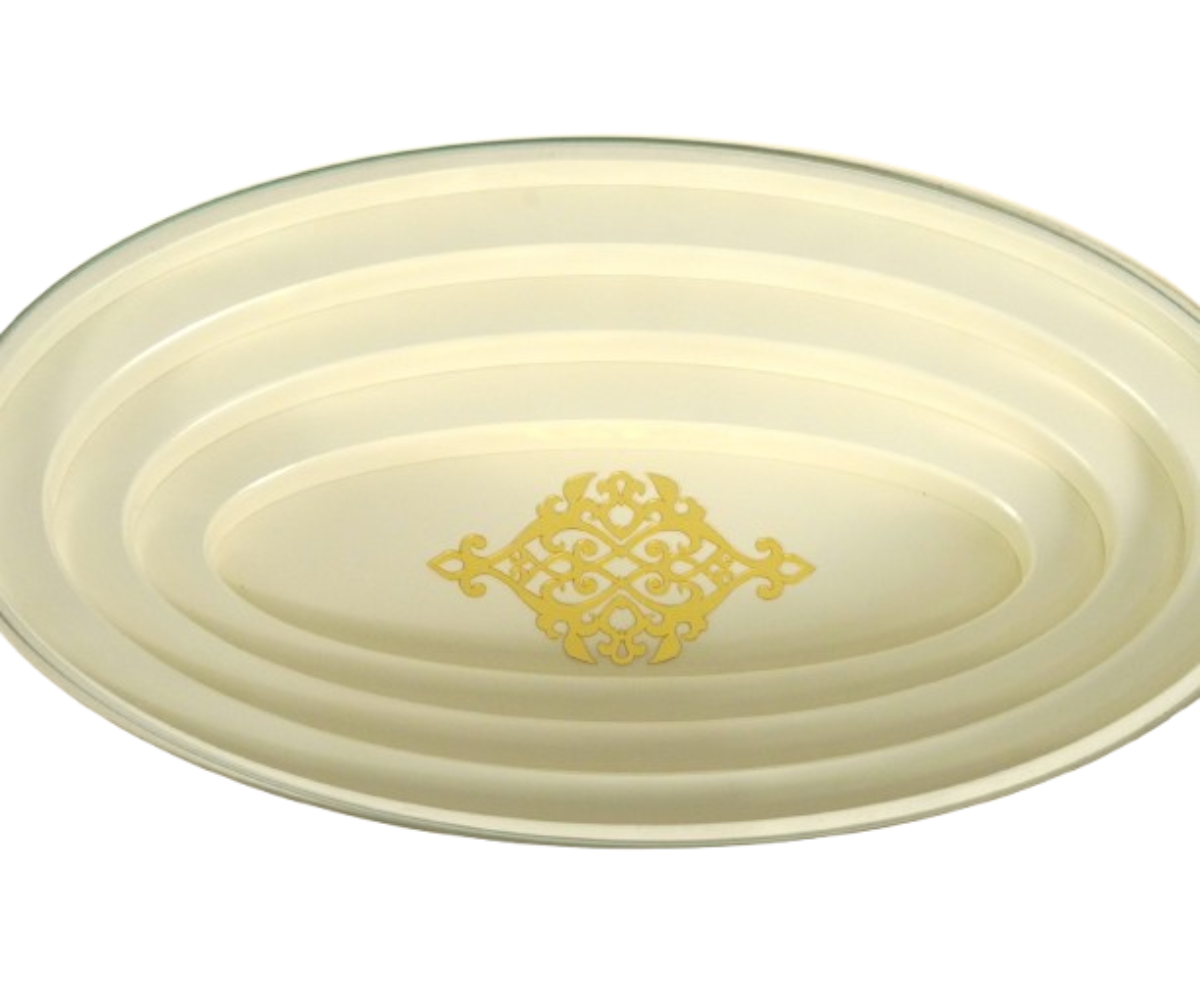011 cream glass table beside an armchair in a classical panelled room