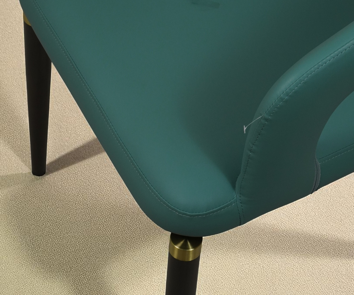 034 leather signature armchair in teal, front view with a curved open back