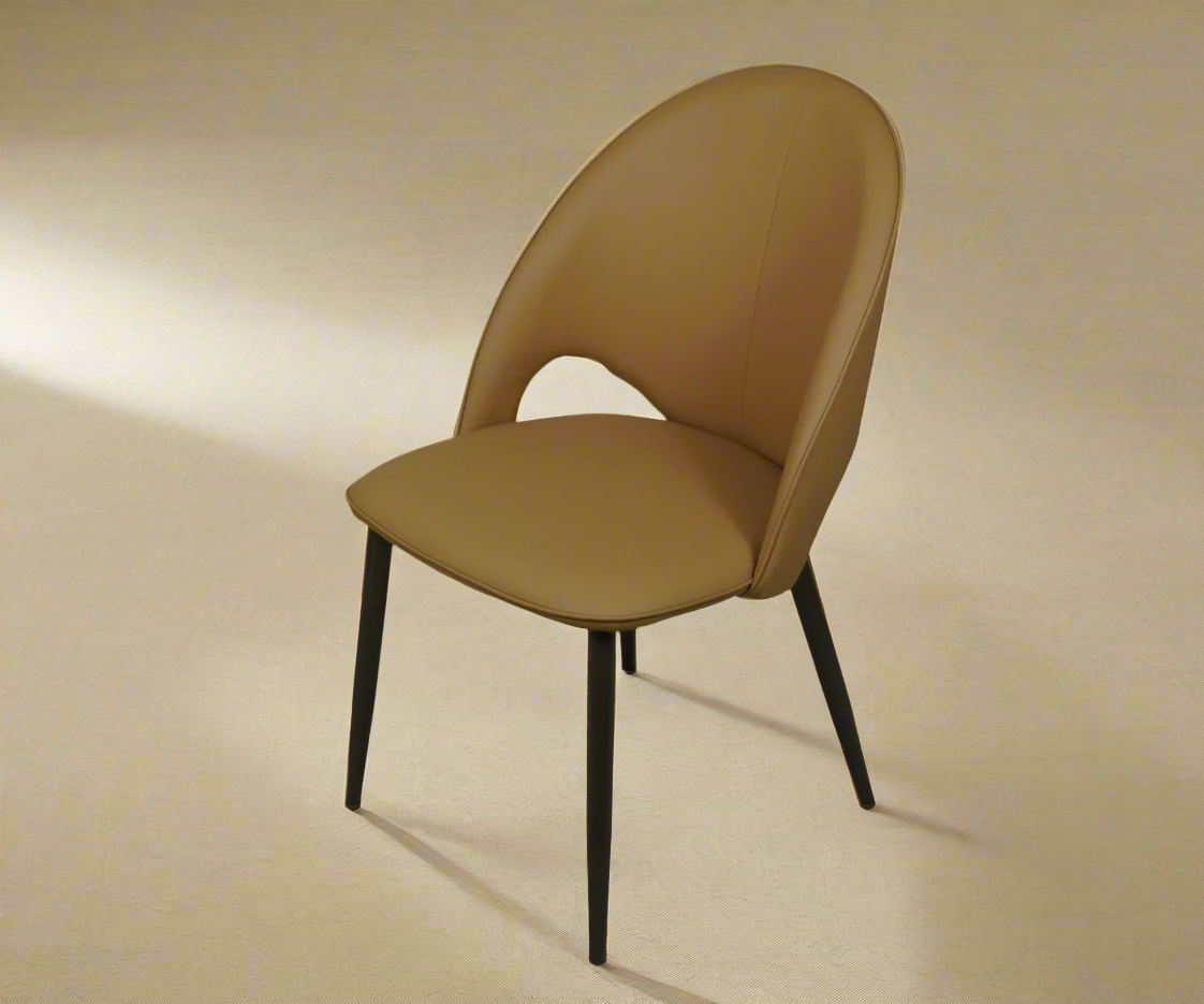 065 ochre minimalist silhouette chair, angled view in raking light