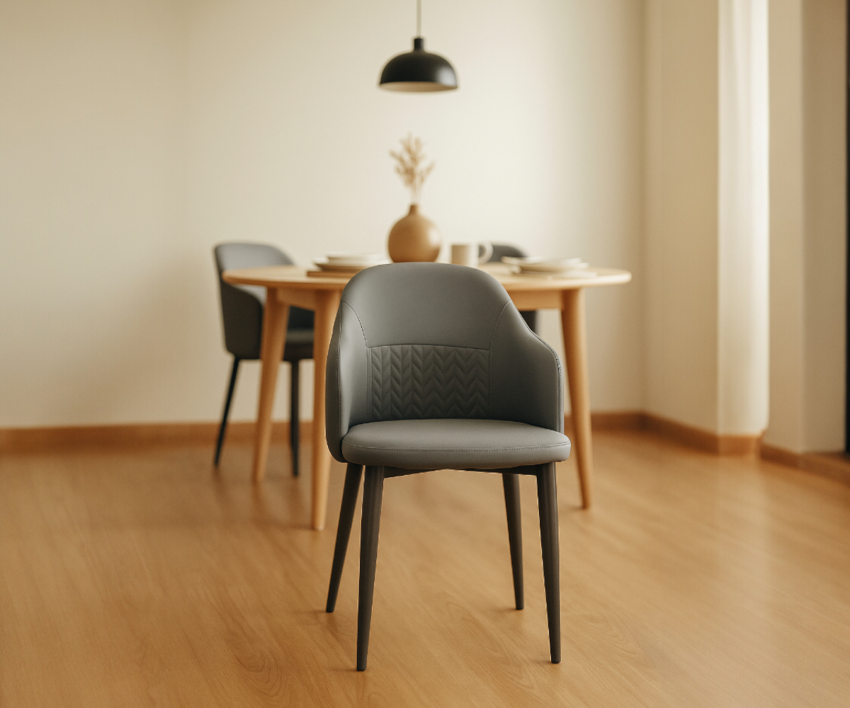 082GRAY slate grey quilted armchair, in a dining room under a pendant lamp