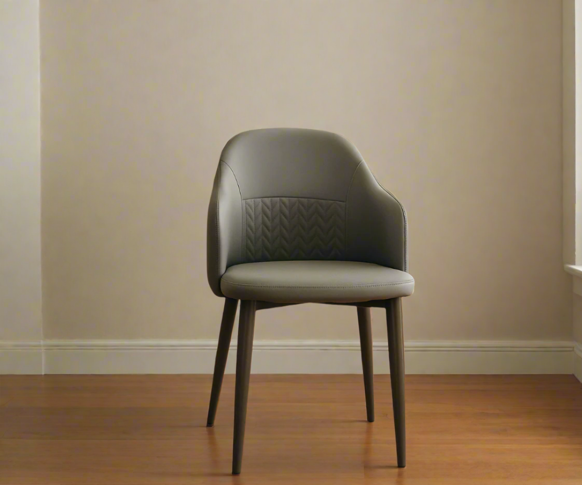082GRAY slate grey quilted armchair, in a dining room under a pendant lamp