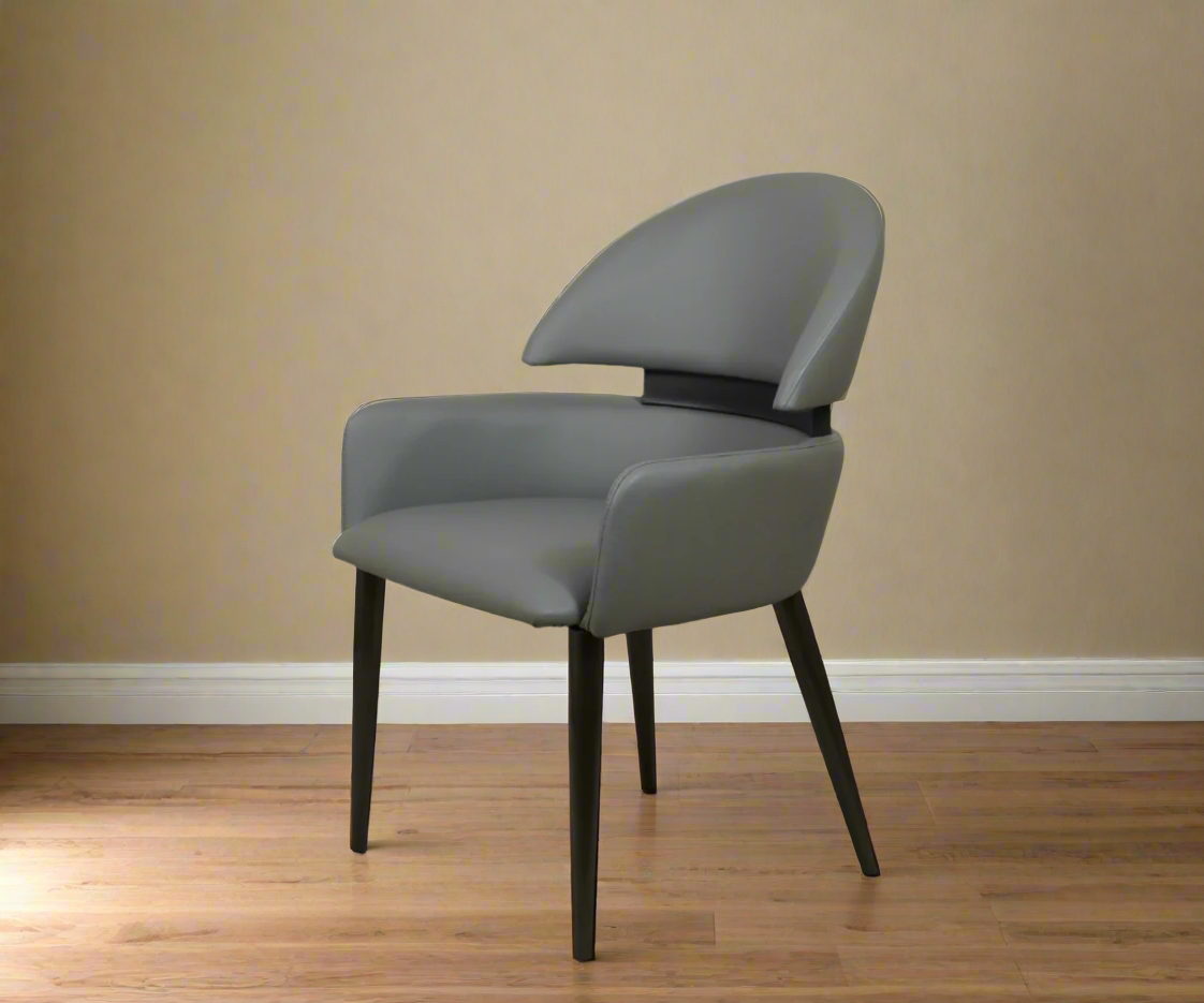 104 modern woven-texture armchair in grey, angled view on a wood floor