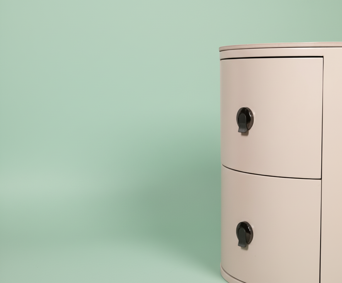 107# curved white nightstand, front view of two drawers on a mint backdrop