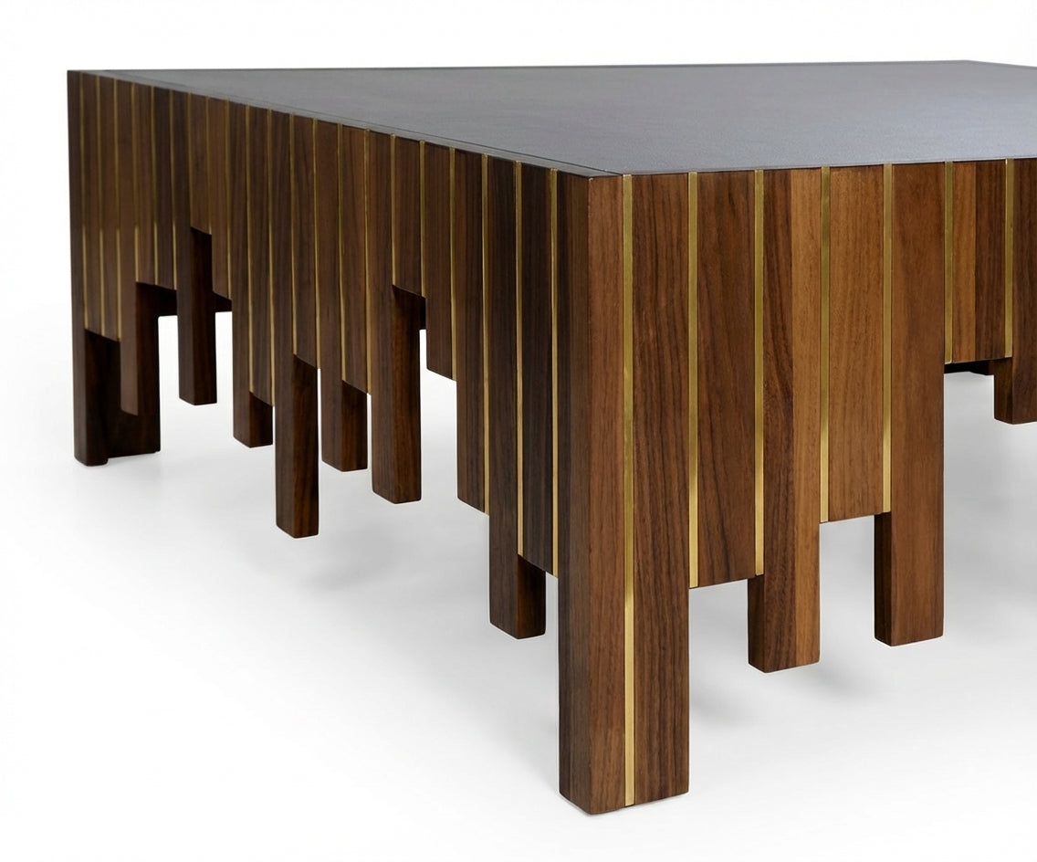119 walnut gold table in a marble-walled living room with a fireplace