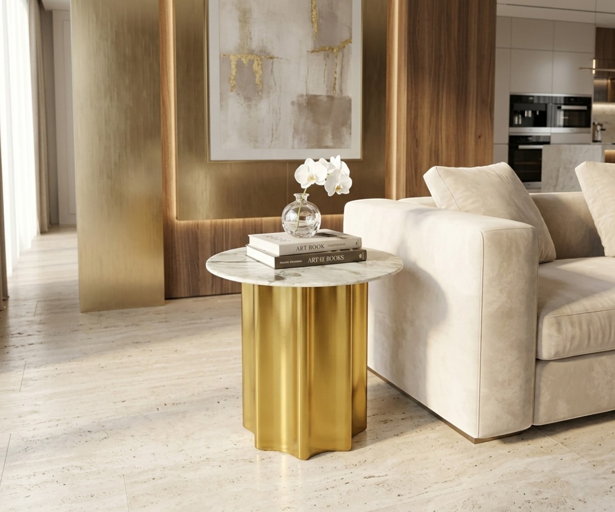 2229 gold marble table beside a cream sofa in a bright living room