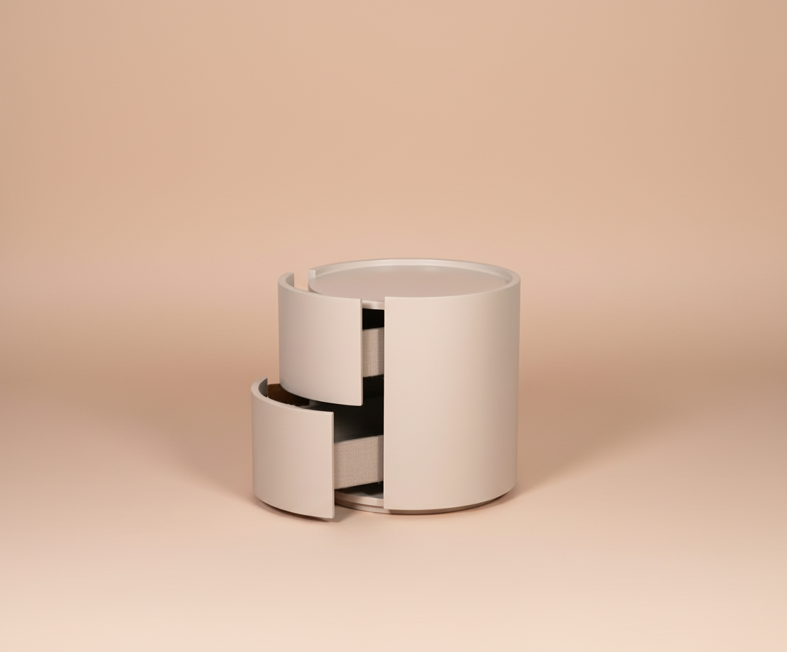 228 round white nightstand, front view of a two-drawer cylinder on peach
