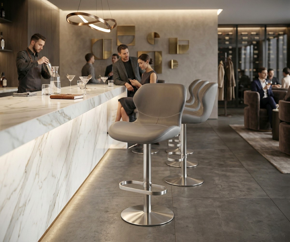 2406 bar chair at a lit marble bar counter in a hotel lounge