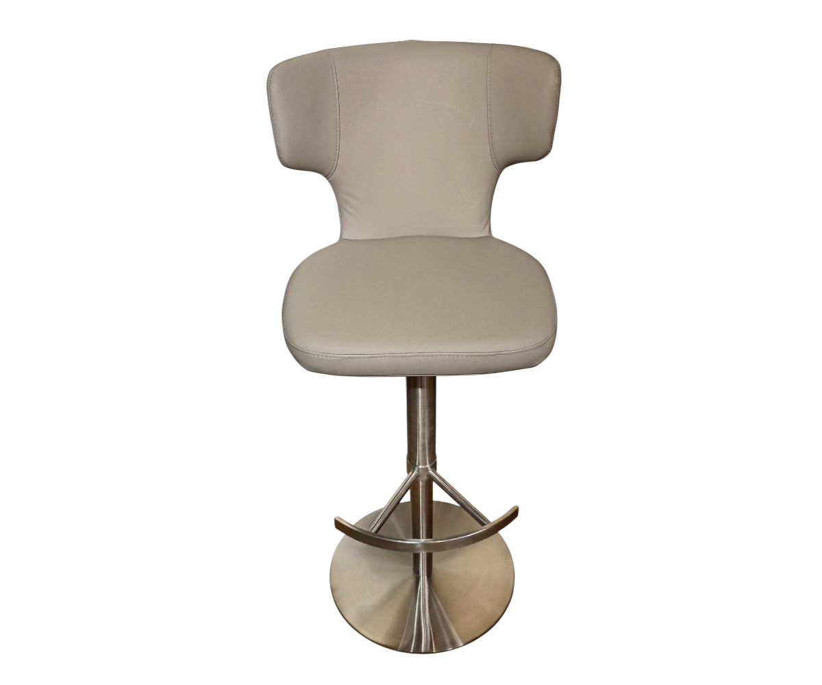 2423 bar chair at a dark stone bar counter in a warm-lit room