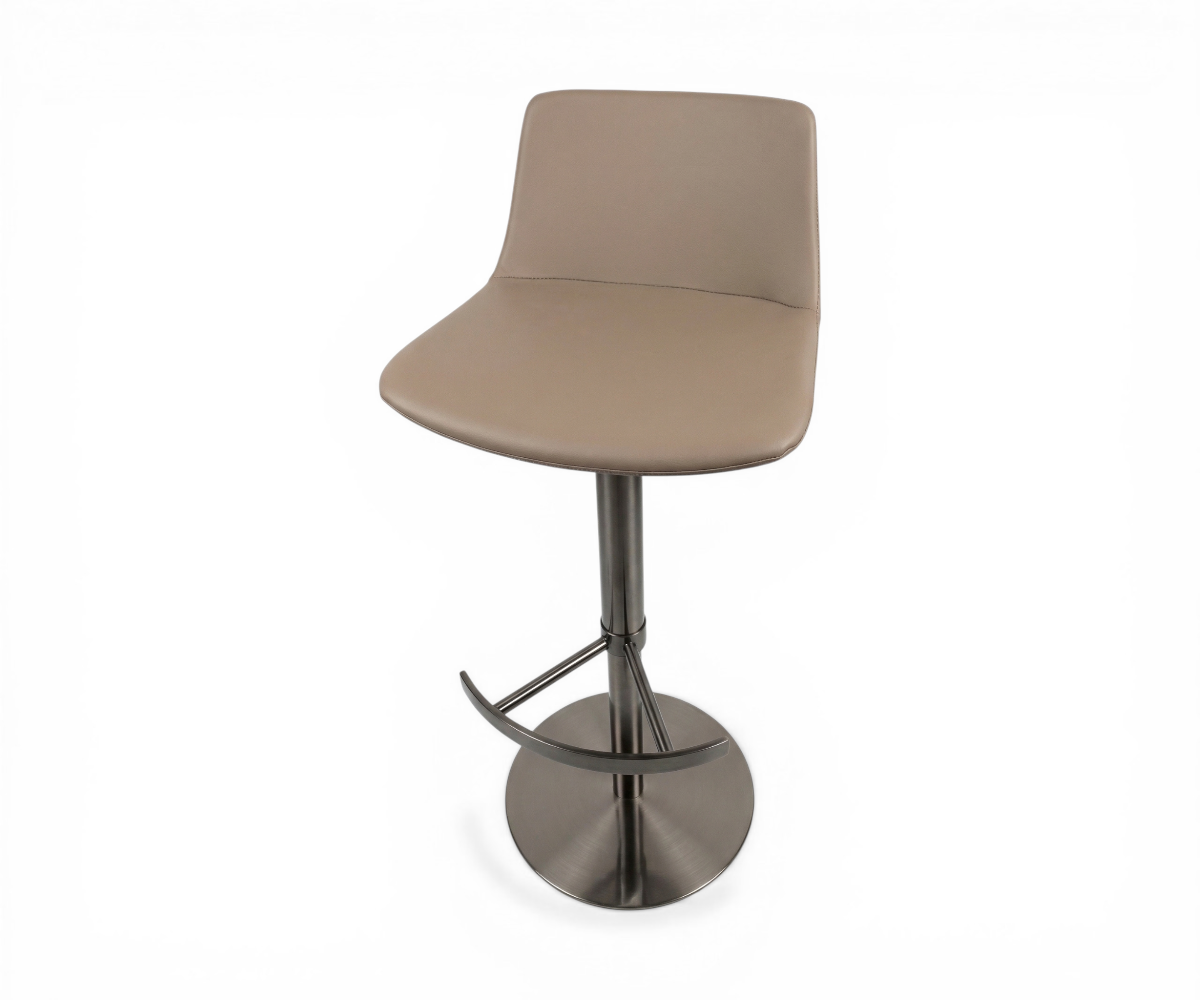 2426 bar chair at a walnut bar with backlit bottle shelving
