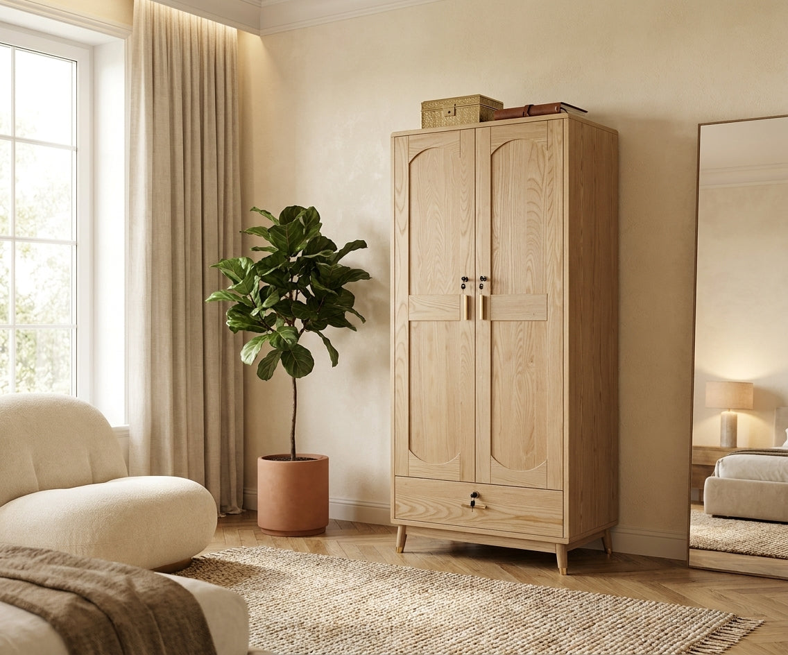 2Door classic wooden wardrobe in a sunlit bedroom beside a fiddle-leaf fig