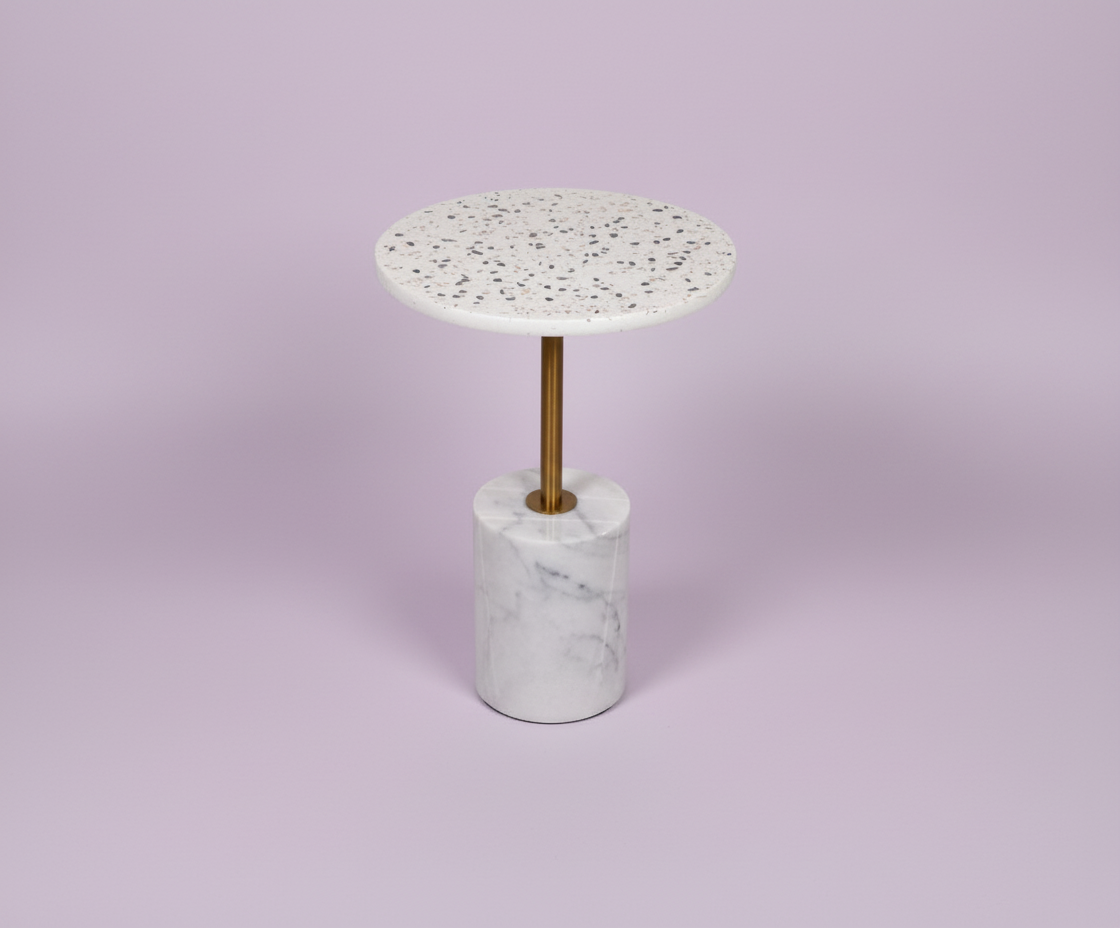 499# white terrazzo table, front view with a speckled top on a marble cylinder