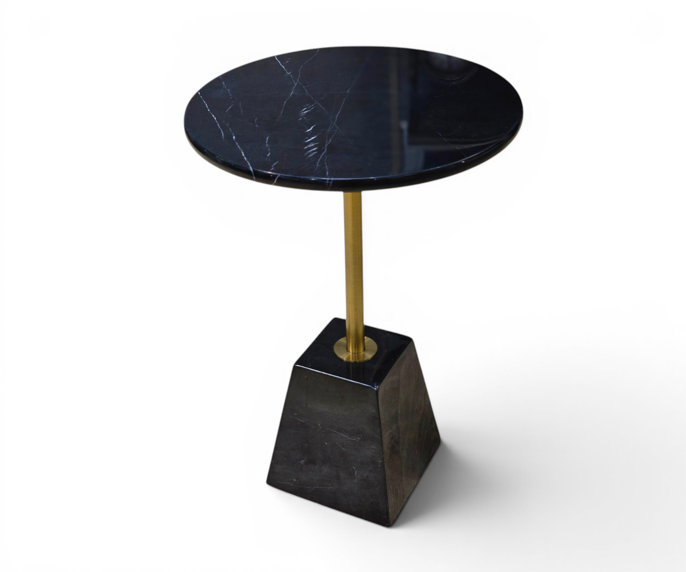 589# black gold table beside an armchair in a city-view living room