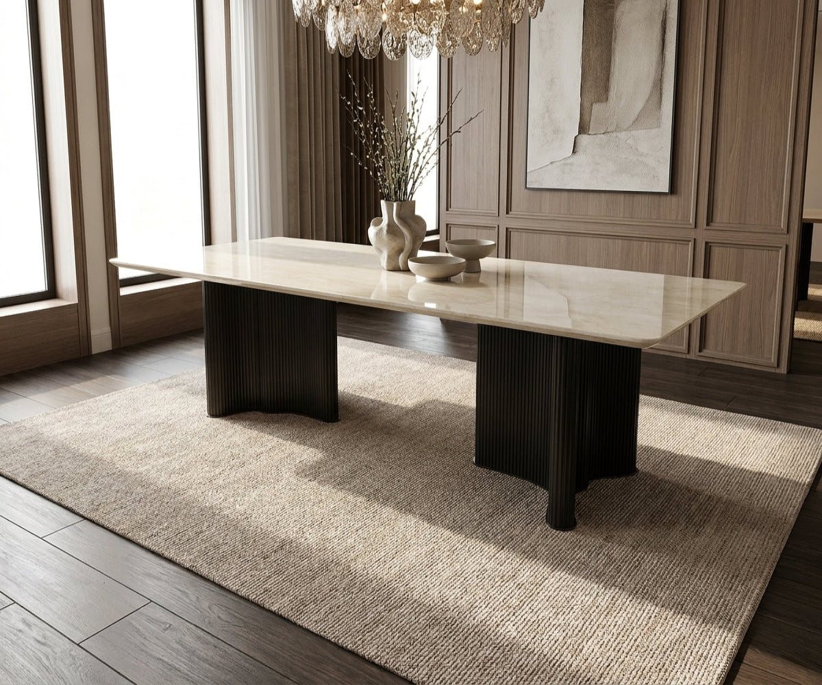 615 dining table in a panelled dining room under a crystal chandelier