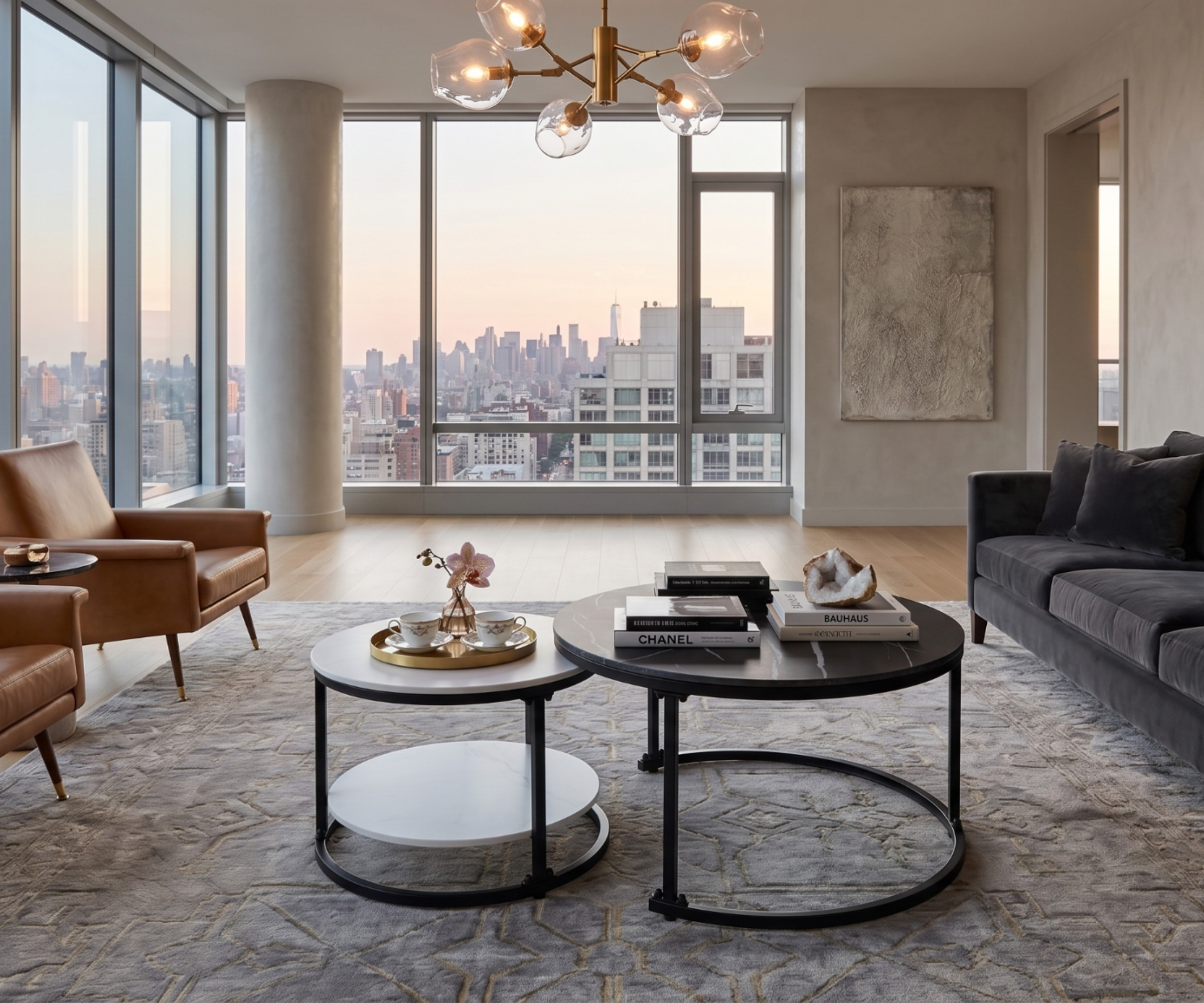 682 marble nesting tables in a city-view living room at dusk