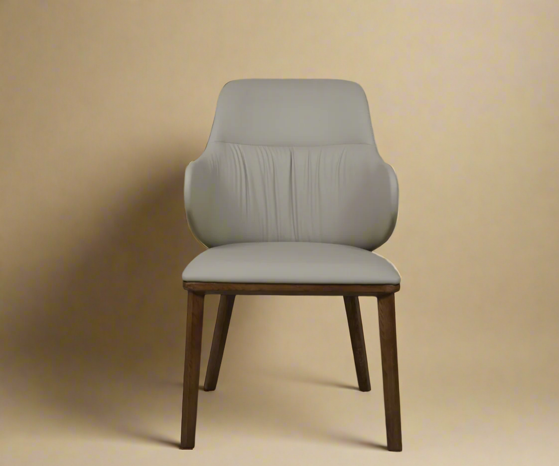6857 designer dining chair, front view with a ruched back on walnut legs