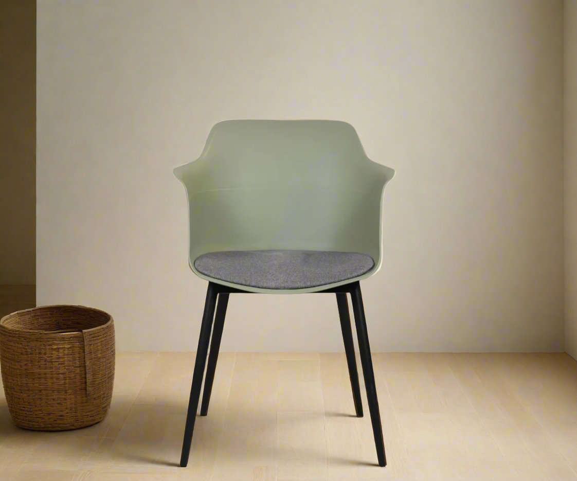8099 ergonomic bucket chair with black legs, front view in sage with a grey seat