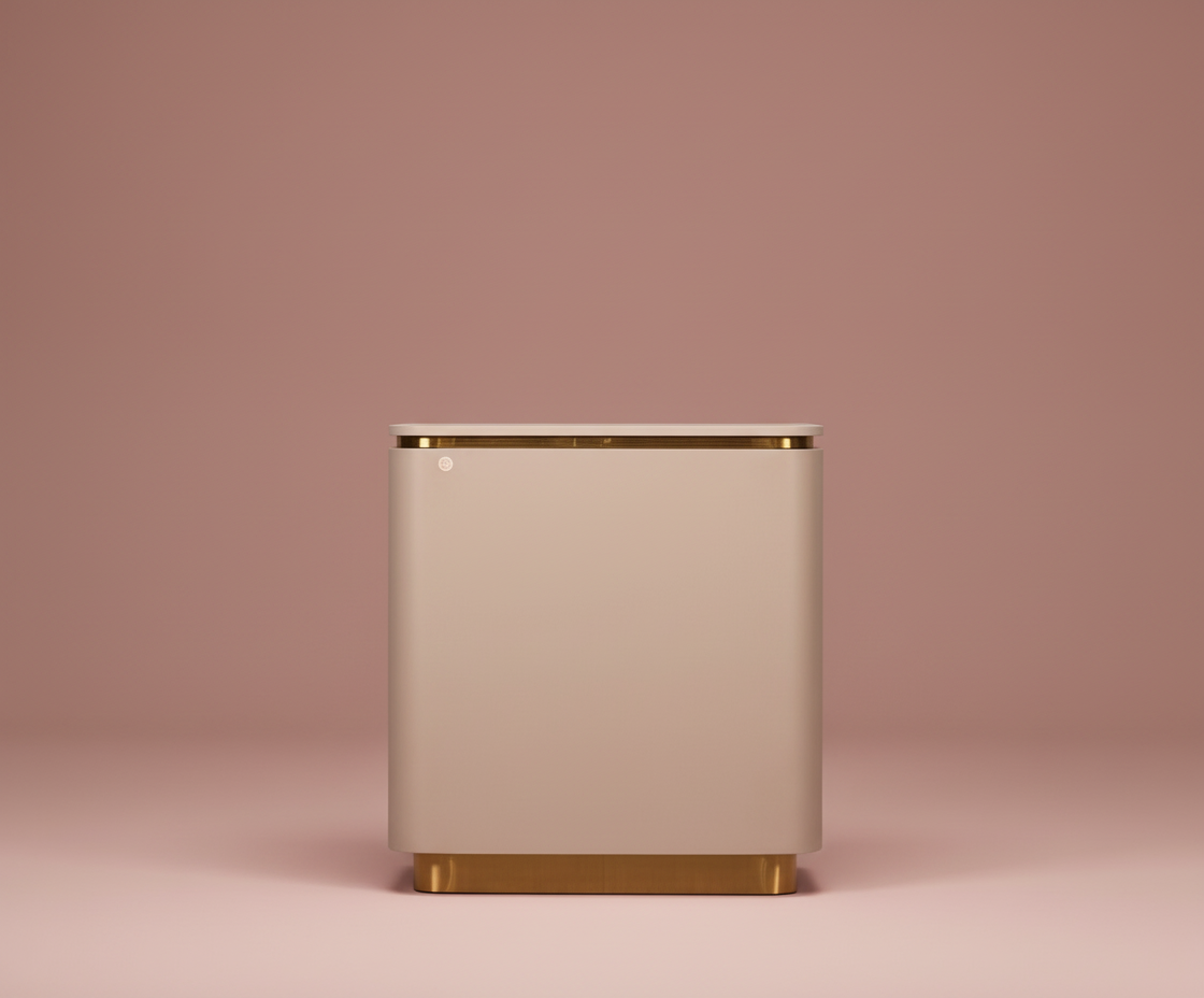 876 beige gold nightstand, front view of three drawers on a brass plinth
