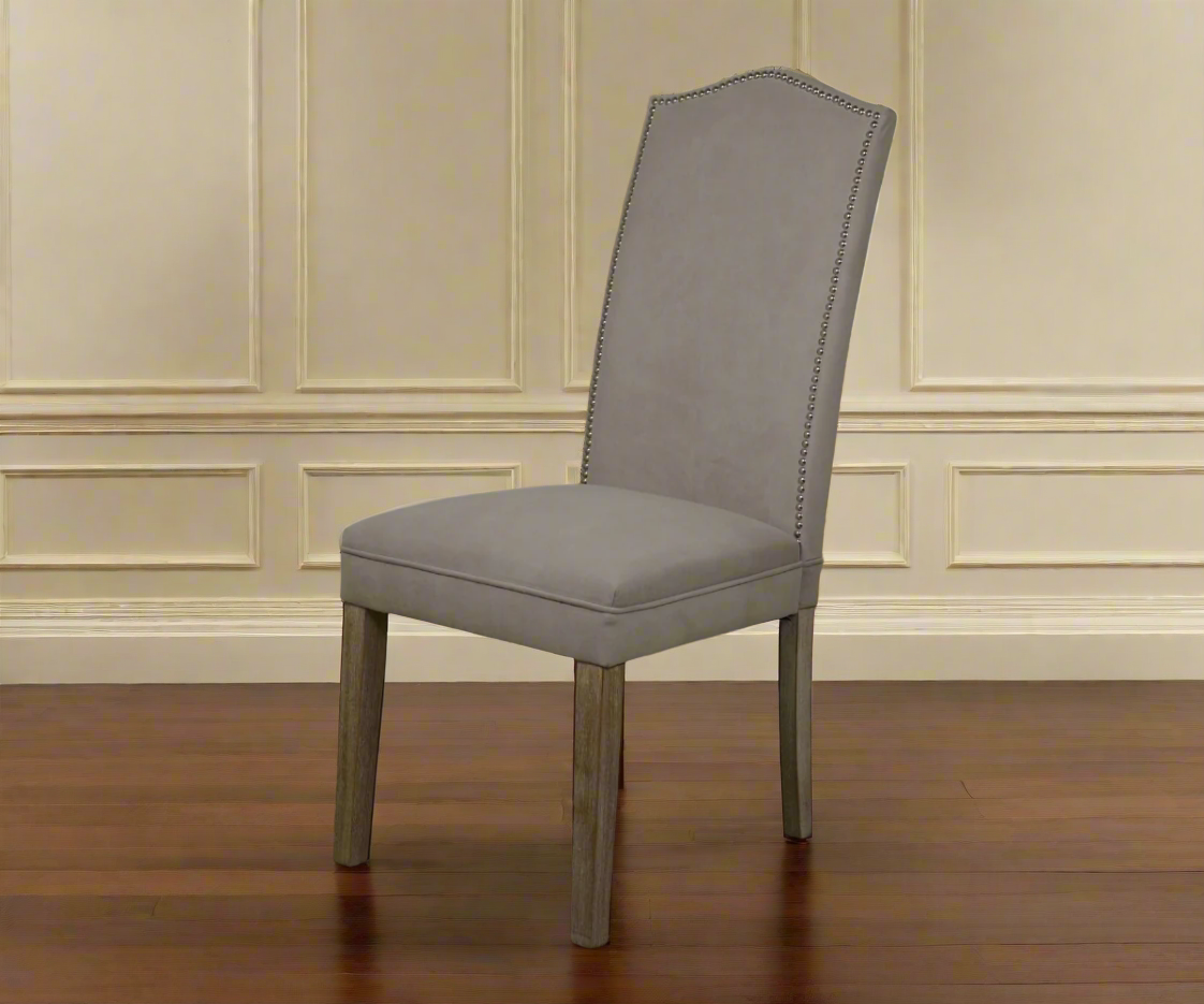 9032 high-back two-tone dining chair, angled view against a panelled wall