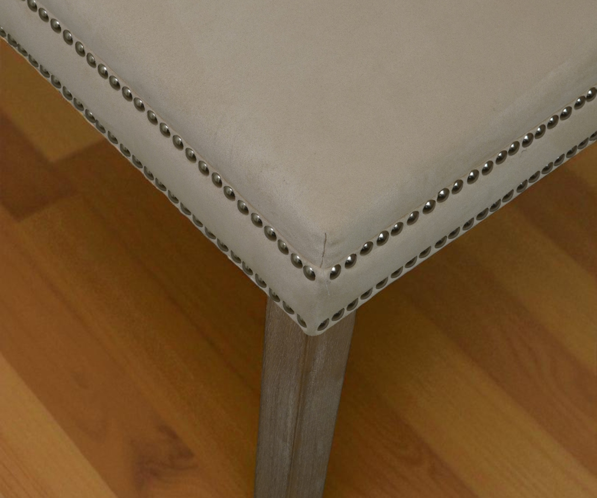9035 sculptural two-tone dining chair, angled view against a panelled wall