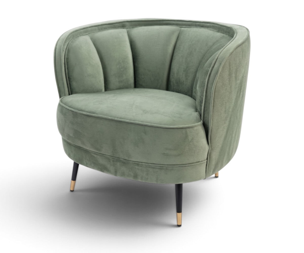 Channel tufted sage green tub chair viewed from an angle