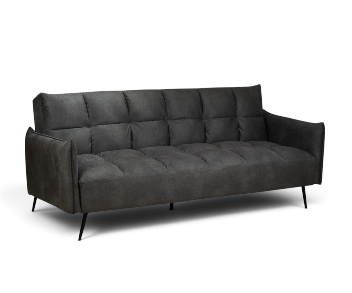 Dark grey faux suede three-seater sofa with tufted seat and quilted back cushions