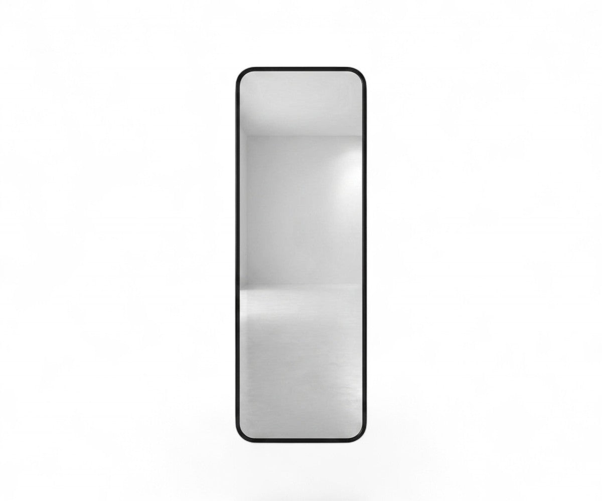 Full-length floor mirror with slim matte black metal frame and rounded corners