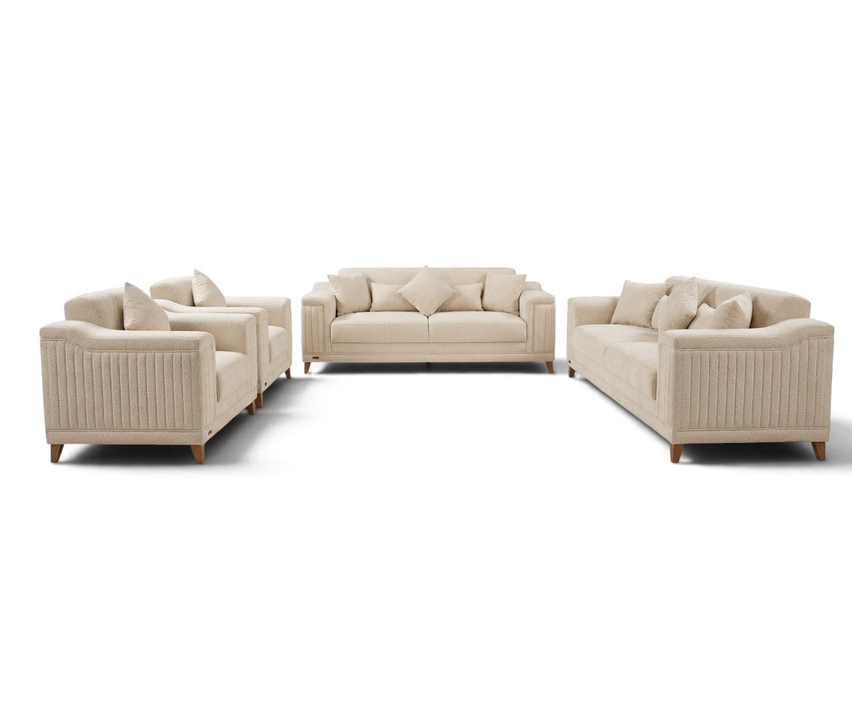 Giselle cream sofa set with two three-seater sofas and two matching armchairs on a white background.