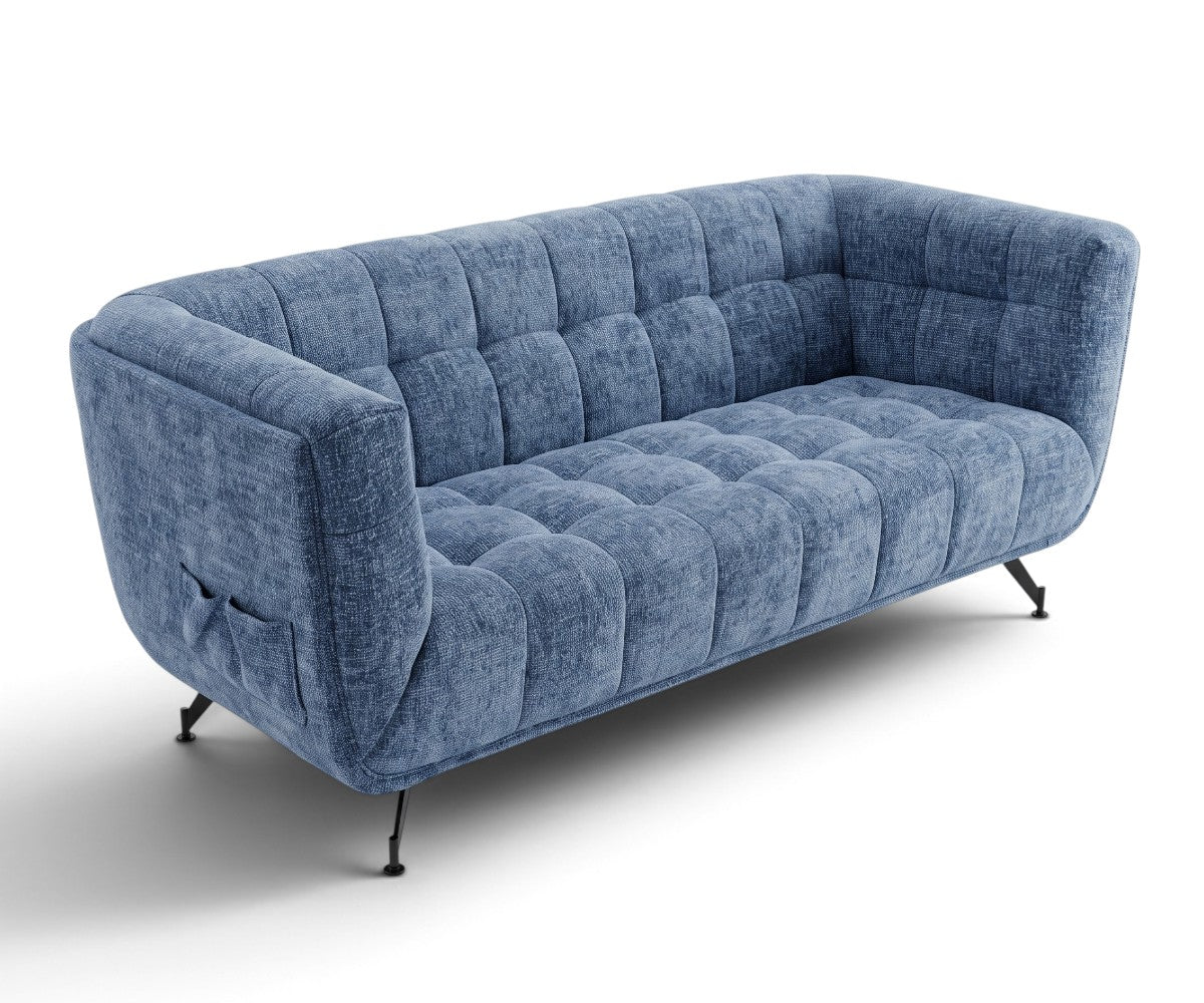 A modern three-seat sofa upholstered in textured blue fabric with channel tufting on the back and seat, supported by slim black metal legs, shown on a white background.