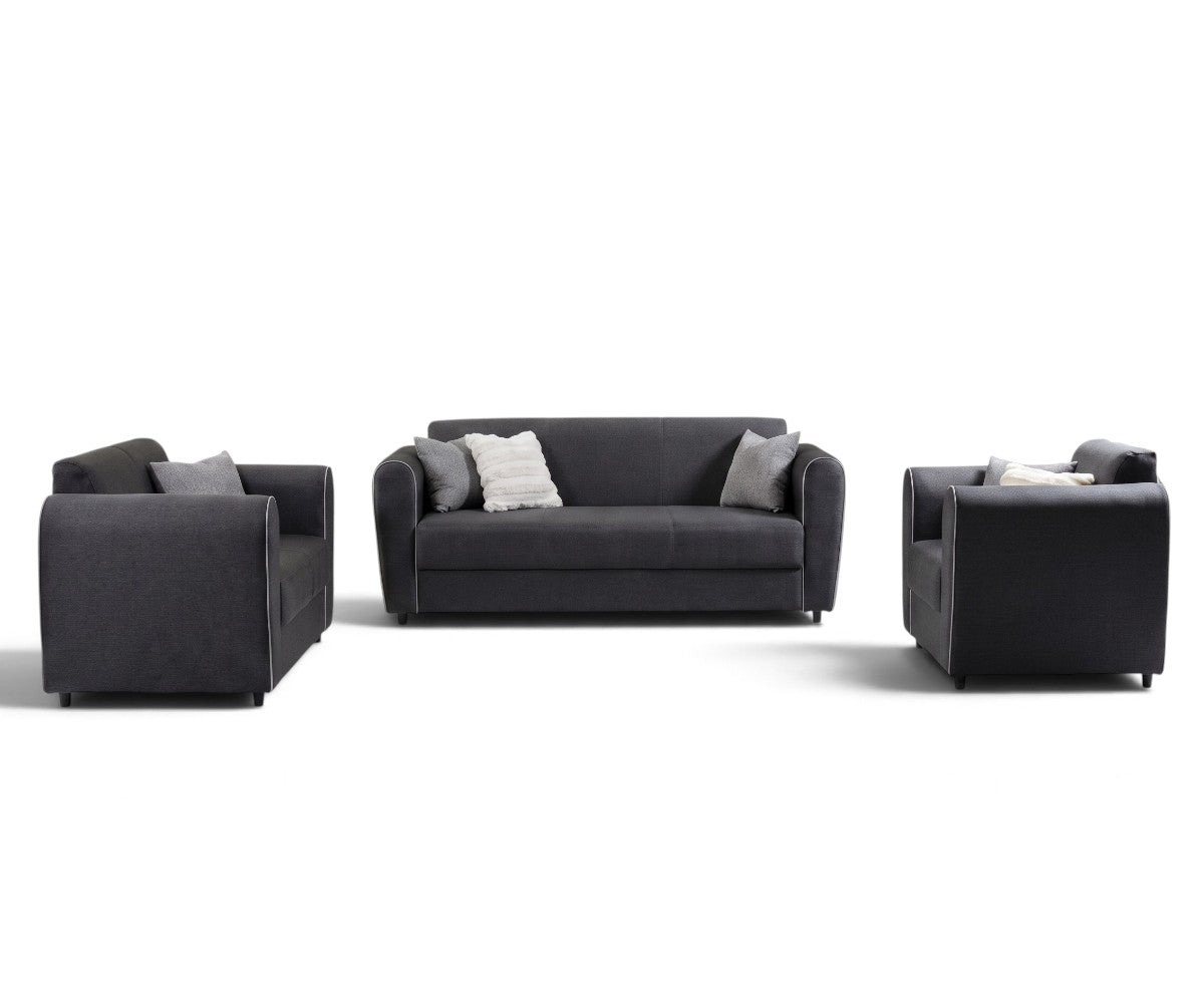 Charcoal grey three-piece sofa set with one sofa and two matching armchairs on a white background.