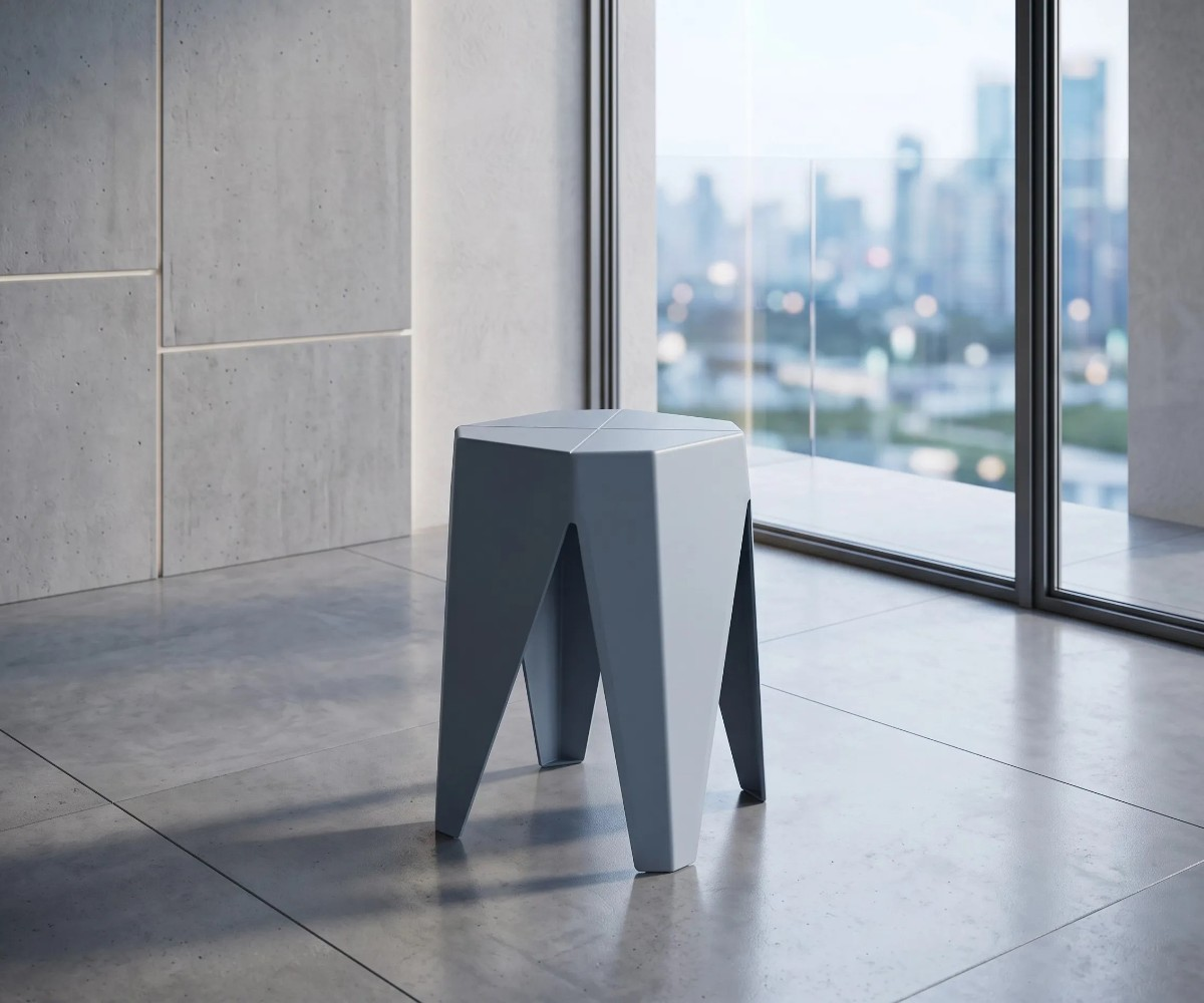 Modern geometric grey stool with faceted seat and angular four-leg design