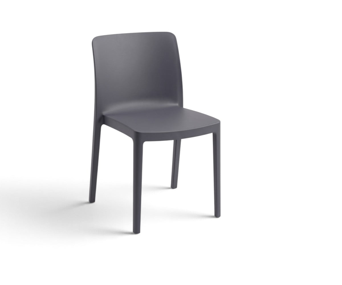 Anthracite grey moulded polypropylene dining chair with armless design and four tapered legs