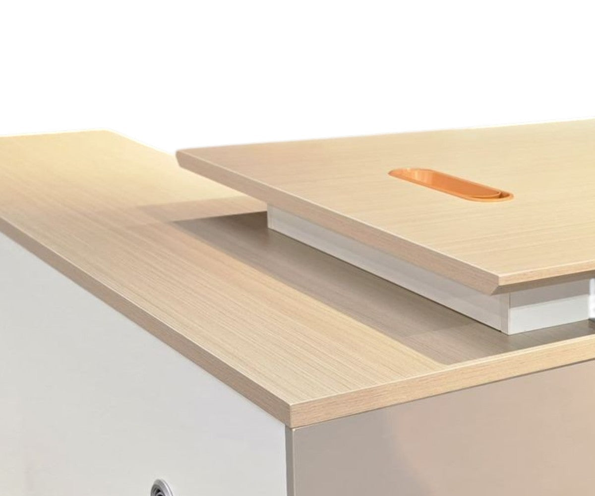 AT02 L-shaped office desk in a bright office with a city view