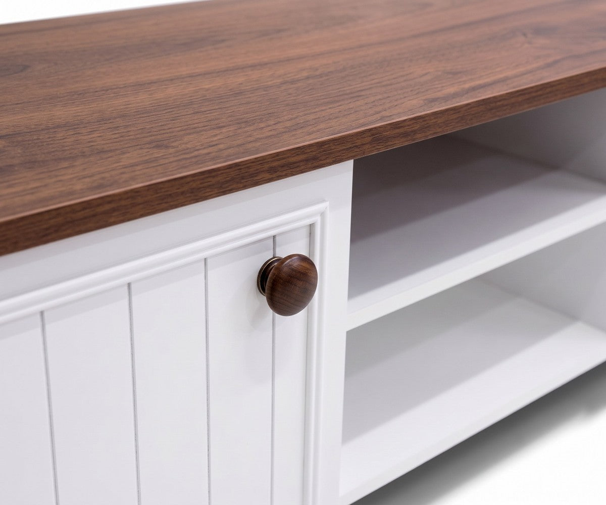 White and wood TV stand with two storage cabinets and bronze knobs
