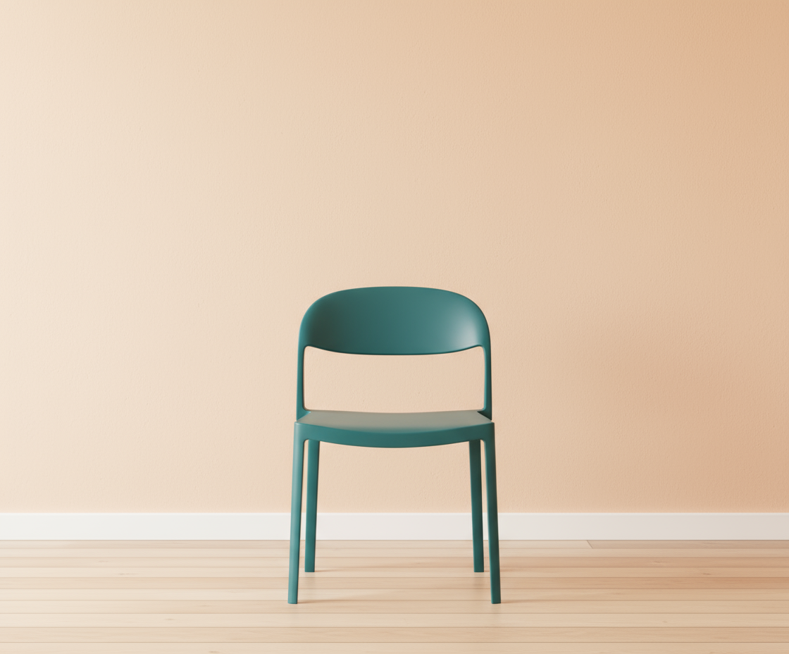 A605 modern architect side chair in teal, front view against a peach wall