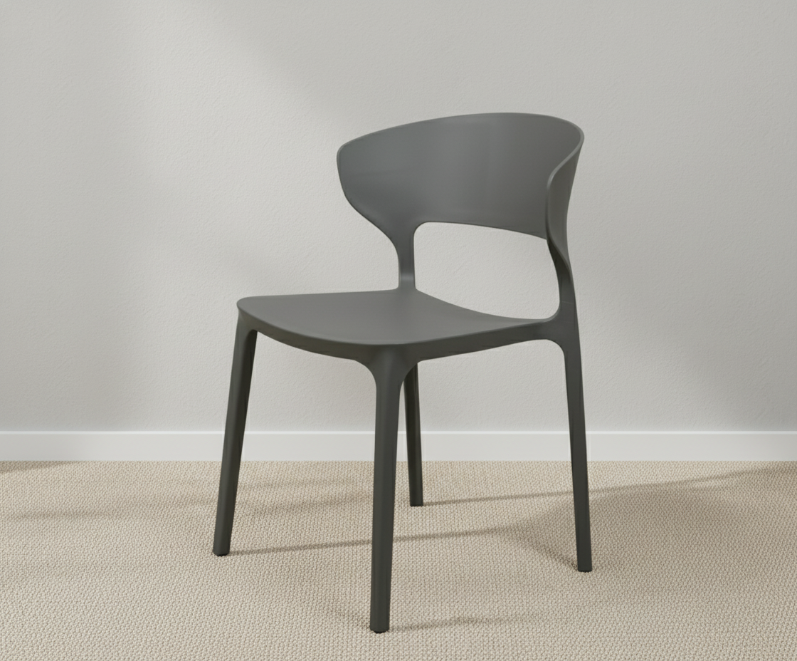 A669 charcoal matte sculptural side chair, angled view against a pale wall