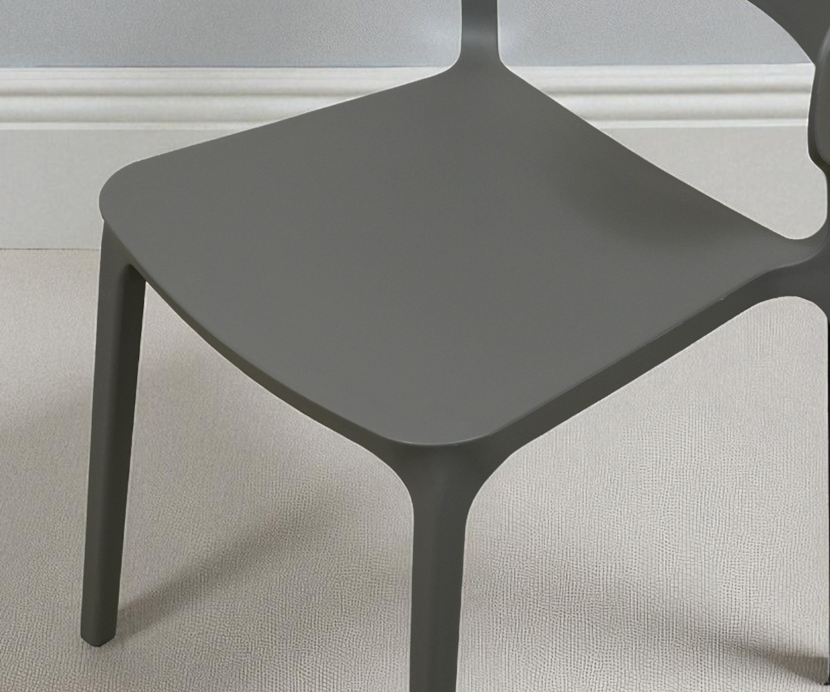 A669 charcoal matte sculptural side chair, angled view against a pale wall