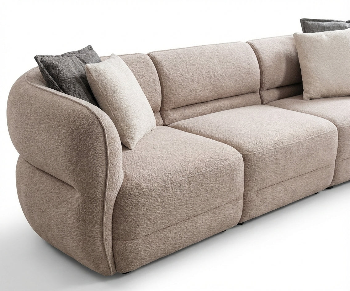 ALFA beige boucle sofa in a warm minimal living room with a low table