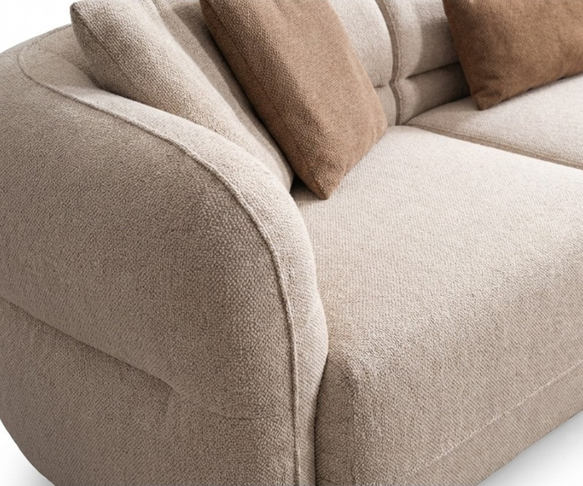 ALFA cream boucle corner sofa in a bright panelled room with a fireplace