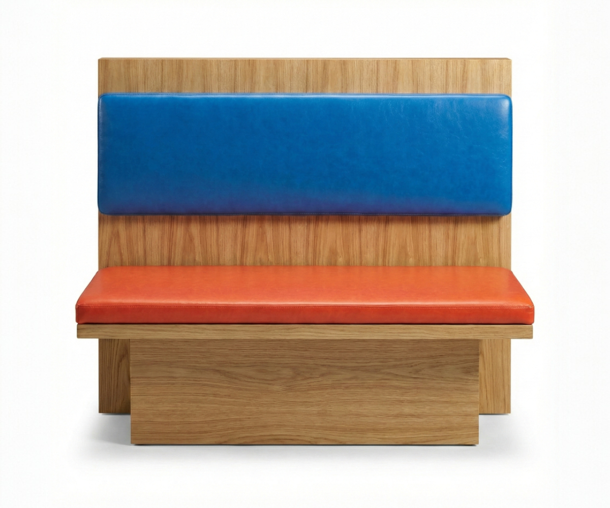 Azure coral booth bench in a wood-panelled restaurant beside abstract art