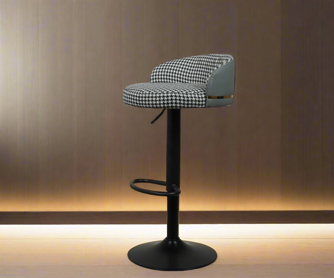 Bar chair H-9018, front view of a houndstooth swivel stool on a black base