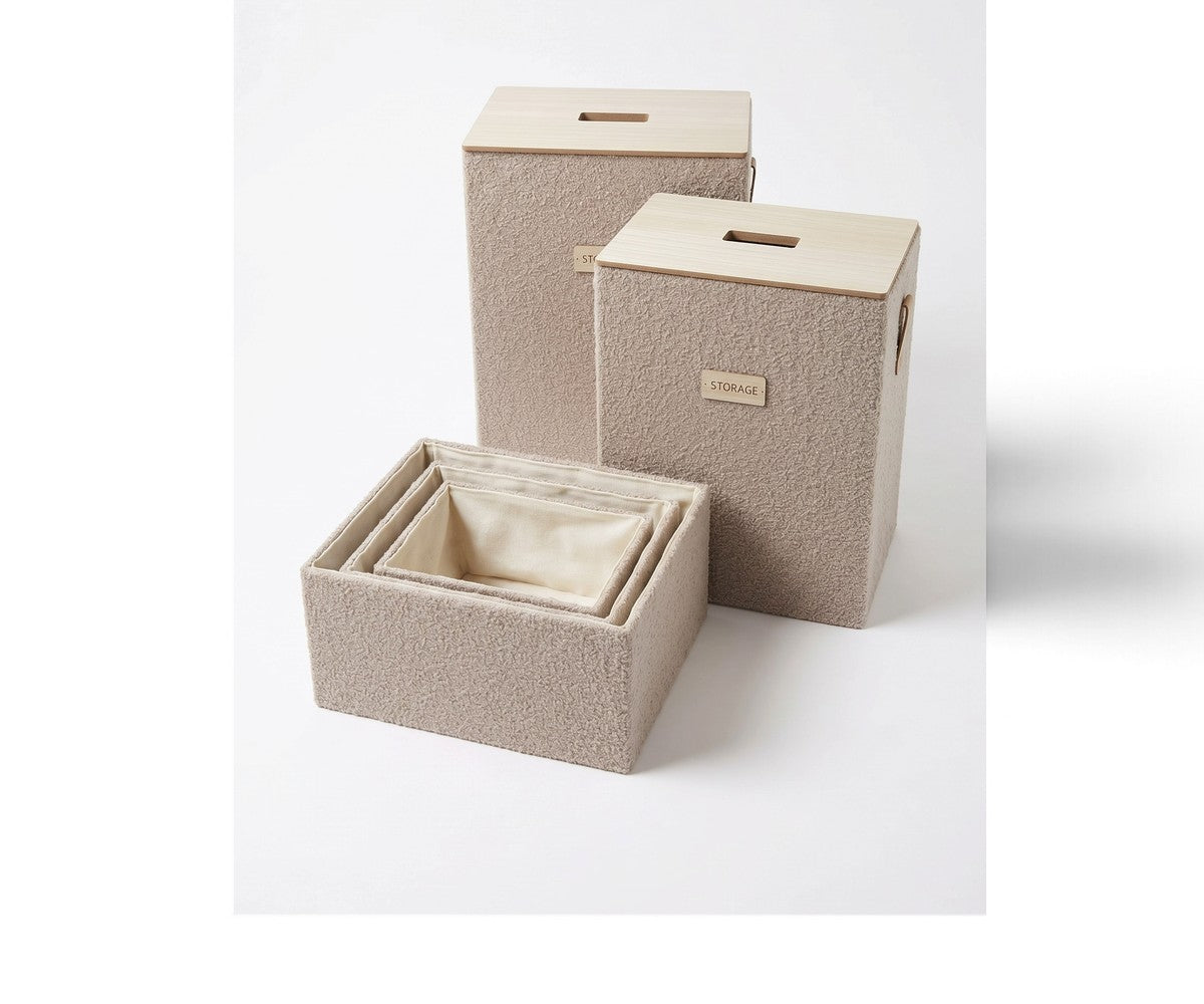Beige textured storage basket set with lids and matching organizers for modern wardrobe storage in Qatar.