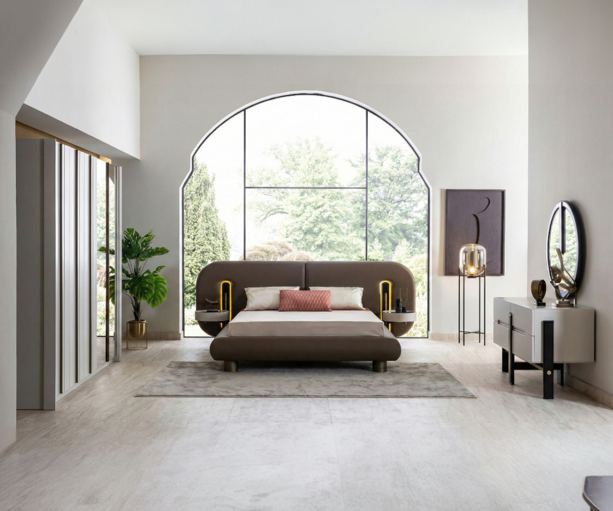 Bergama curved LED bedroom set staged in a bright room with an arched window
