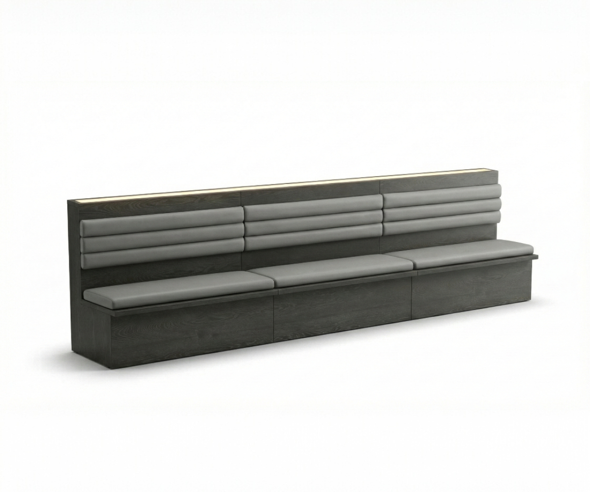Channel back banquette running along a wall in a dark modern restaurant