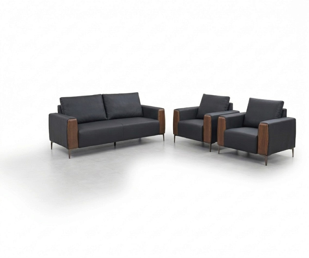 Charcoal and brown three-piece sofa set with two matching armchairs in a luxurious, well-lit modern living room