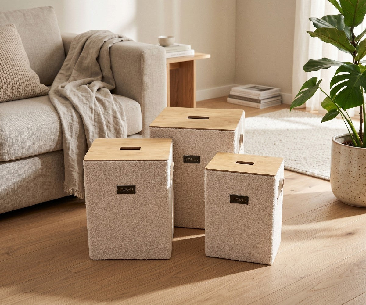 Cream three-piece storage basket set with light natural-tone lids styled in a luxurious, well-lit modern dressing room
