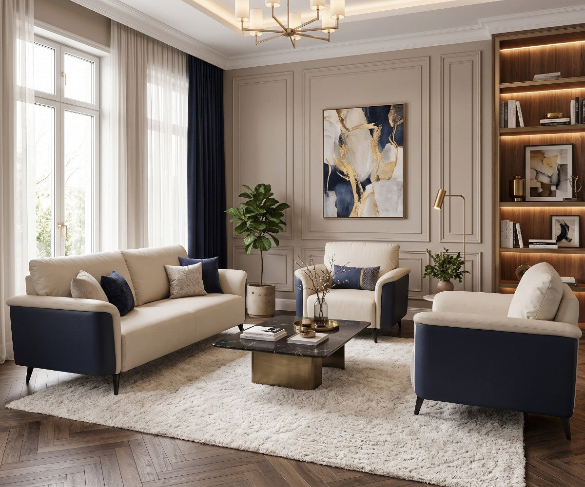 Cream and navy three-piece sofa set with two matching armchairs in a luxurious, well-lit modern living room