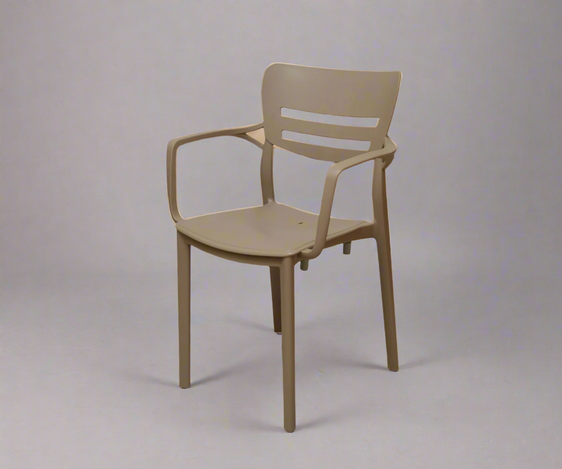 CT033 slotted taupe armchair, angled view against a pale wall