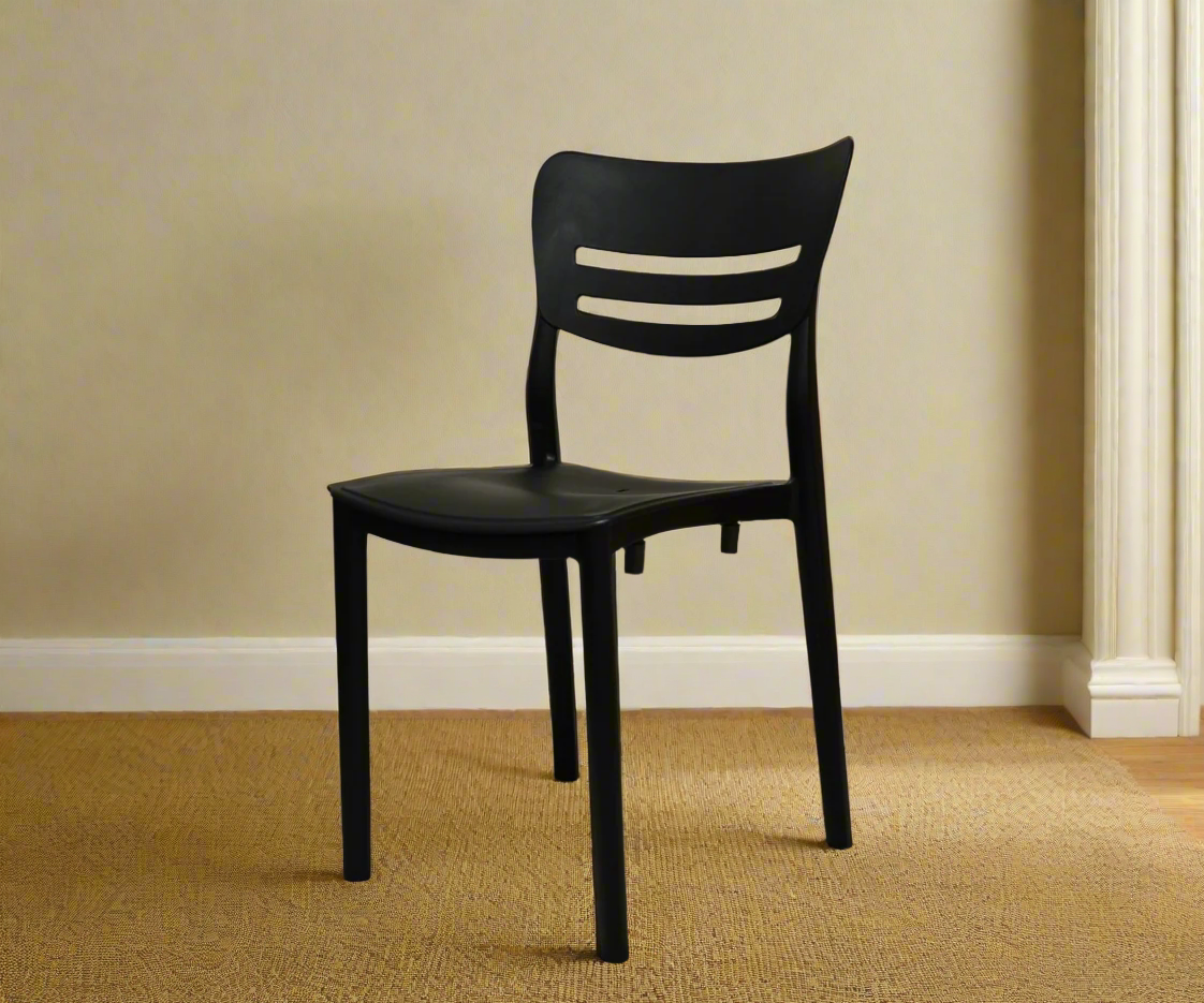 CT036 YAPRAK chair black105, angled view against a cream wall
