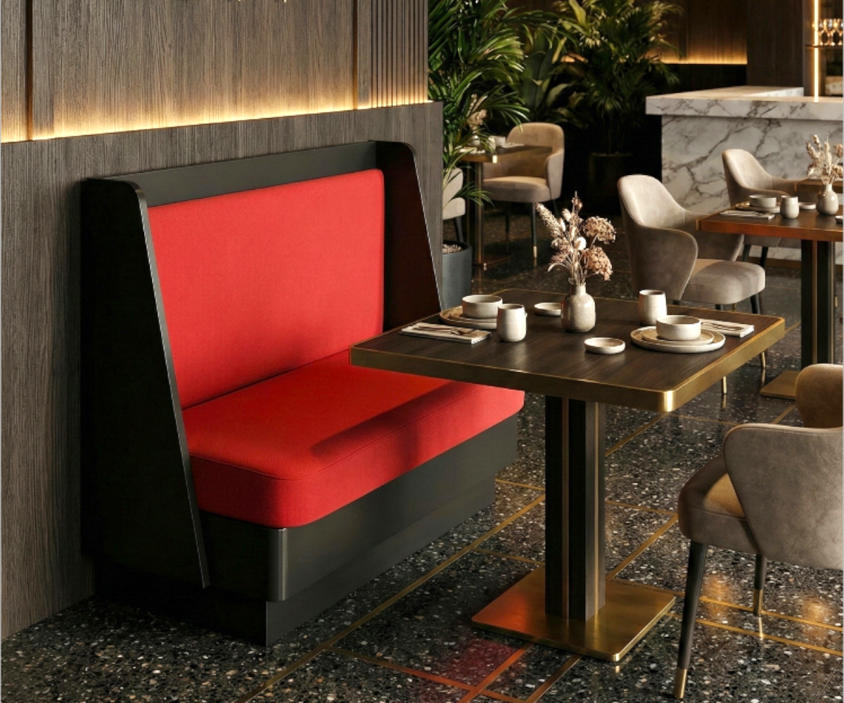 Diner booth single in a warm restaurant beside a walnut table and terrazzo floor