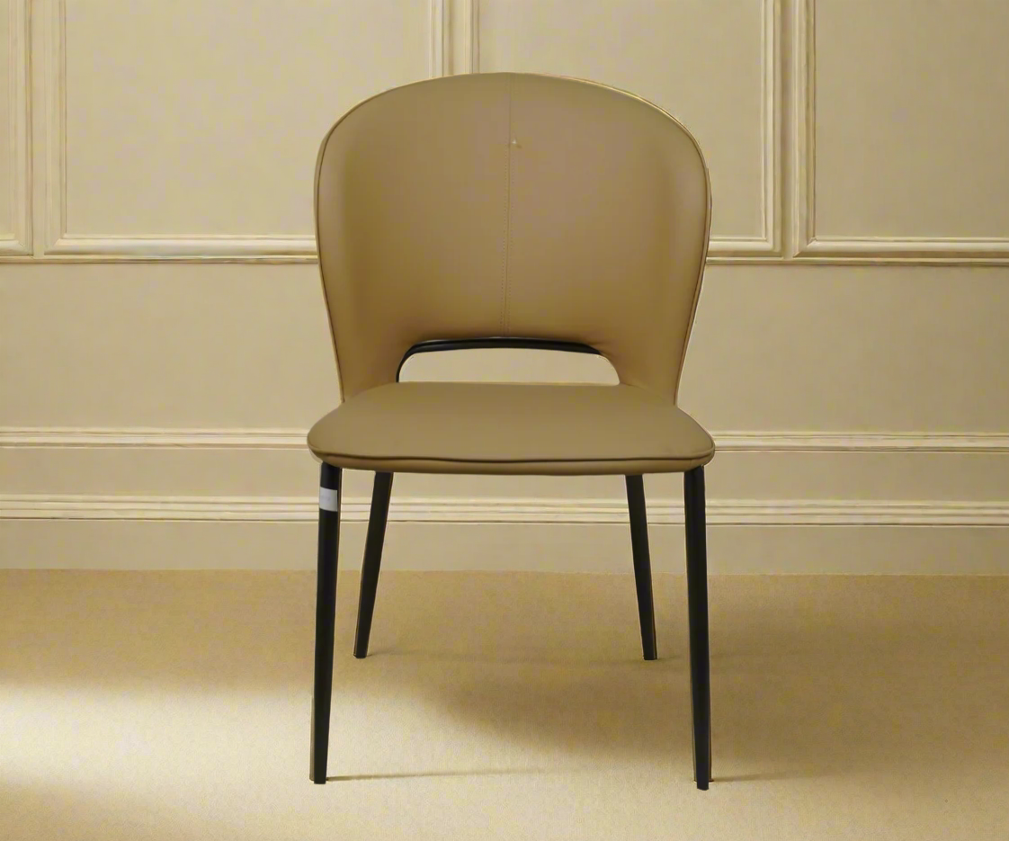 Dining chair 087 B, front view in tan with a cut-out curved back
